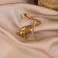 Vintage gold rabbit brooch for women, elegant animal lapel pin for coat and dress accessories. - Vintage Rabbit / Gold