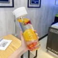 Clear plastic water bottle portable outdoor sports travel cup with fruit infusion infuser lid. - 600ml / Clear White