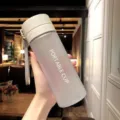 Bouteille d'eau de sport portable en plastique givré avec sangle, design étudiant anti-chute. - 600 ml [Dépoli] gris clair
