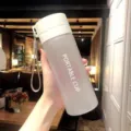 Bouteille d'eau de sport portable en plastique givré avec lanière pour la salle de sport. - 600 ml [Dépoli] blanc simple