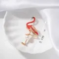 Detailed macro view of an elegant flamingo brooch with red enamel and pearl - Flamingo Style (#33) / Red