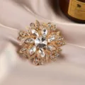 Close-up detail of exquisite crystal flower brooch, sparkling rhinestones on alloy base. - Flower / Clear