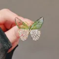 Elegant butterfly brooch pin with sparkling crystal wings and gradient green details. - Green Double Leaf Butterfly Style (#109)