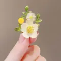 Elegant floral brooch variant with white flowers and green leaves for stylish women. - Daisy