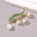 Exquisite lily of the valley pearl brooch pin, elegant green enamel floral accessory for women. - Lily of the Valley Flower