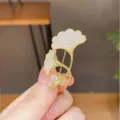 Elegant gold ginkgo leaf brooch pin with sparkling cubic zirconia crystals for women fashion jewelry. - Ginkgo Leaf Style