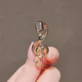 Gold music note microphone brooch, elegant alloy fashion jewelry accessory for women daily wear. - Microphone Note Style