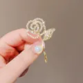 Elegant rose flower brooch with sparkling rhinestones and pearl detail for women fashion. - Rose