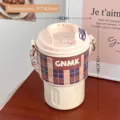 Thermos à café portable en acier inoxydable 316 crème avec manchon à carreaux chic - Café à carreaux marron