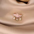 Exquisite pink enamel umbrella tassel brooch featuring sparkling rhinestones and crystal drops. - Tassel Umbrella Style / Pink