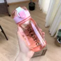 Tragbare Kunststoff-Wasserflasche mit auslaufsicherem Deckel und rosa Design für Sport. - 400ml / Rosa