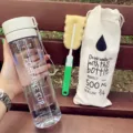 Bouteille d'eau en plastique portable avec sac en toile et brosse pour le sport et le quotidien. - Bouteille en PC transparent avec couvercle gris, 800 ml