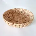 Detail van waterhyacint opbergmand, close-up weergave van ronde natuurlijke broodmand. - 30*18*8 cm / Originele Kleur