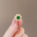 Small elegant flower-shaped brooch pin with a vibrant green crystal and clear stones - Gypsophila (126#)