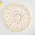 Bohemian style round cotton woven placemat featuring printed pattern and decorative fringe - Pattern 1