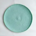 Tovaglietta rotonda intrecciata con bordo pompon, tappetino verde menta per la cucina. - 38 cm / Verde