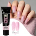 Macro detail of Nude Pink Shimmer acrylic nail gel showing glossy and frosted finishes. - B02 Nude Pink Shimmer / 15g Pack