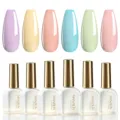 Detailweergave van 6-kleuren pastel nagelgel set met gouden dop witte flesjes - 6 Kleuren Set 05
