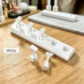 Detailed view of white heart-shaped nail art display stand and training holders - Non-Magnetic Heart Nail Stand / White
