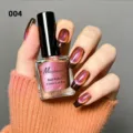 Detail view of shimmering cat eye nail polish with a galaxy polarized effect - Dopamine Cat Eye Nail Polish 04
