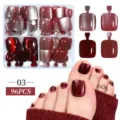 Detailed display of 96pcs cat eye press-on toenails in deep red burgundy glitter finish. - 96 Pcs / Dark Red Berry Cat Eye (03)