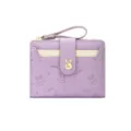 Joli portefeuille lavande avec motifs de lapin gaufrés et fermoir doré en forme de lapin. - Violet