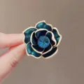 Elegant blue and green enamel flower brooch with a large sparkling central crystal - Blue Enamel Floral / Flower