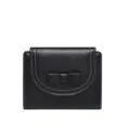 Elegant black women's short wallet featuring a bow accent and white contrast stitching detail. - Black