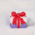 Miniature resin Christmas gift box ornament with purple base and vibrant red bow decoration - Purple Gift Box Ornament (No. 7)