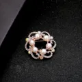 Elegant circular metal brooch featuring white pearls and sparkling crystals - Sparkling Ring Pearl Style