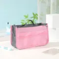 Multifunktionale Kosmetiktasche mit vielen Fächern und praktischen Griffen für Ordnung. - Rosa
