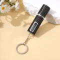 Vista detallada de un atomizador de perfume de 5ml con pedrería de diamantes negros - Negro