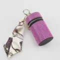 Exquisite detail of pink rhinestone lipstick pouch keychain with floral silk scarf accessory - Pink