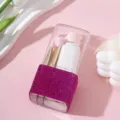 Detailed macro view of portable pink rhinestone makeup brush storage box and brushes - 8Pcs Set / Rose Red
