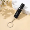 Détail de la texture brillante en strass noirs sur un vaporisateur de parfum 5 ml - 5ml / Noir