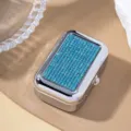 Detail showing the sparkling blue rhinestone inlay on the polished silver pill box - Lake Blue