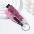 Close-up of the sparkling pink rhinestone car safety hammer featuring a keychain - Pink Inlaid (C3)