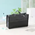 Multifunctional dark grey storage bag with double zippers and mesh pockets for daily use. - Black
