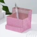 Close-up detail of the sparkling pink rhinestone nail tool and brush organizer for desk - Pink