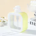 Close-up detail of yellow rhinestone encrusted square refillable pump dispenser bottle - 300ml / Iridescent Yellow