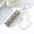Detail view of 5ml perfume bottle with colorful rhinestones and pearl keychain - Colorful Zirconia