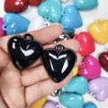 Glossy acrylic heart charms for DIY jewelry making in various vibrant solid colors - Black