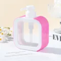 Close-up detail of luxury square refillable pump bottle with pink rhinestone accents - 300ml / AB Pink