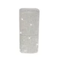 Macro view of luxurious rhinestone-covered portable cotton swab organizer for travel - White