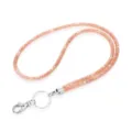Close-up detail of a rose gold rhinestone lanyard featuring a sparkling mesh design - 49cm / Champagne