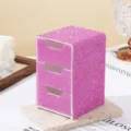 Macro view of a luxury pink rhinestone-covered three-tier drawer jewelry organizer - 1 Piece / Pink