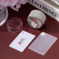 Detailed view of rhinestone nail stamper kit with floral lace pattern plate - AB White