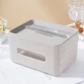Close-up detail of luxury rhinestone tissue box with built-in remote organizer - White