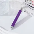 Detail of purple rhinestone nail dotting pen with wax tip for crystal picking - Deep purple