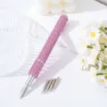 Detail view of rhinestone nail art pen with five interchangeable metal tips - Pink